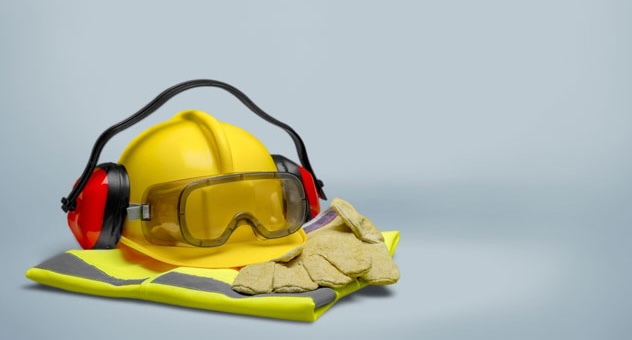 PXL_20230507_142535864 Hard hat, protective gloves, hi-vis jacket, goggles and ear defenders arranged in pile