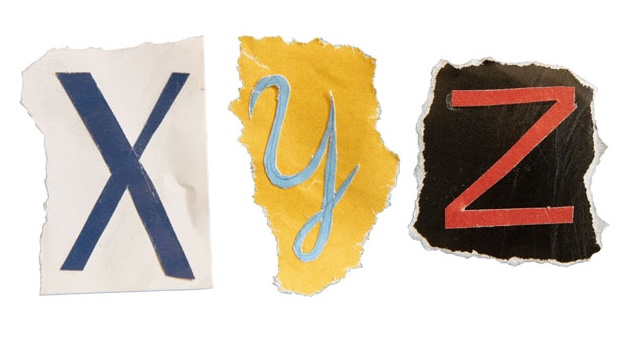 PXL_20230507_142535864 torn paper scraps of capital letters X Y Z in different fonts