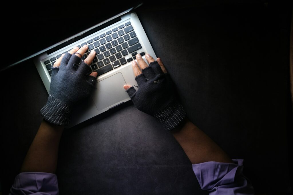 thief at a computer