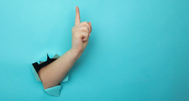 hand-blue-paper
