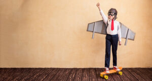 Little boy businessman with wings