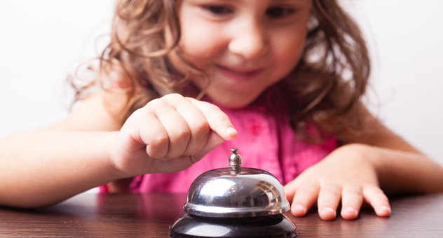 little-girl-pushing-bell