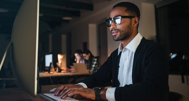 man-concentrating-at-computer