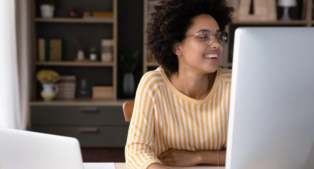 smiling-woman-computer-home-office