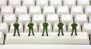 Toy soldiers on keyboard