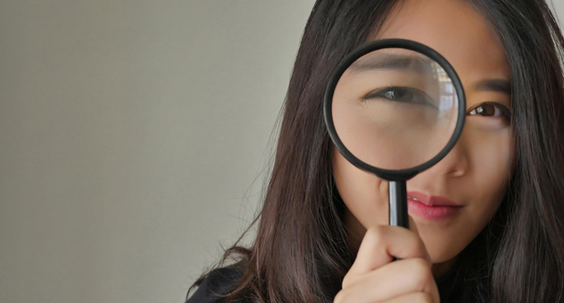 woman-magnifying-glass