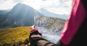 Woman navigating mountain