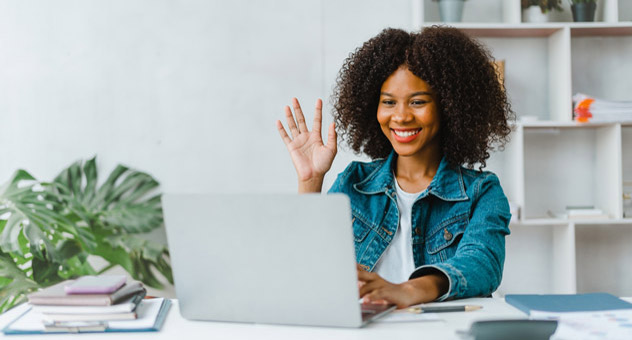 woman-waving-to-computer