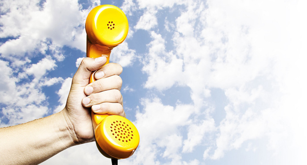 yellow-phone-against-sky