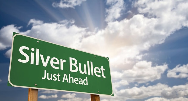 Road sign that reads 'Silver Bullet Just Ahead'
