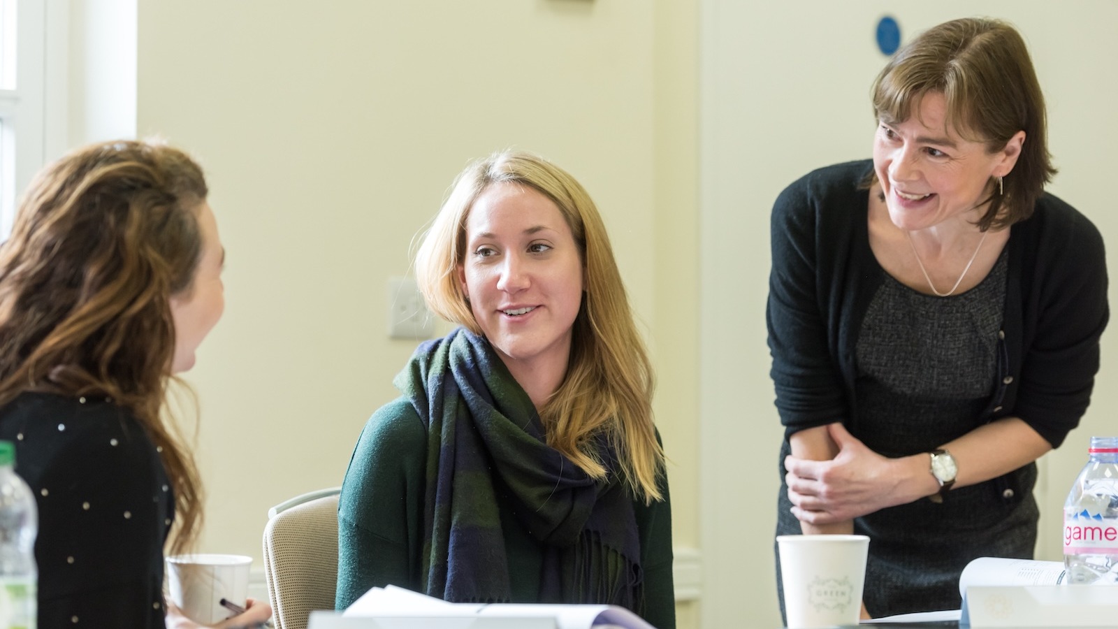Emphasis trainer Wendy Ferguson in action, helping two learners in person